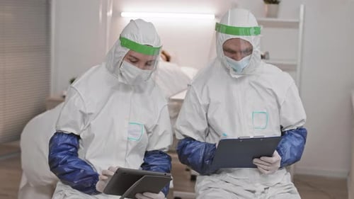 Medical Professionals Reviewing Data in Hospital Setting