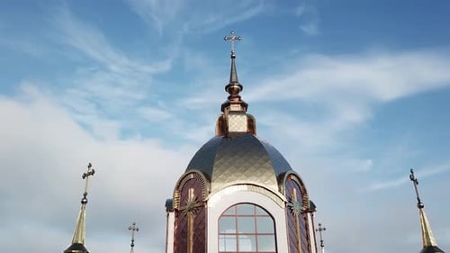 Aerial View of Cathedral Blue Dome with Golden Stars Cross.