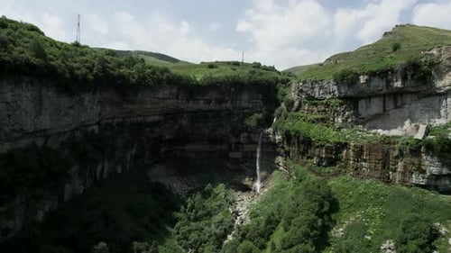 Summer huge rock formations and a waterfall