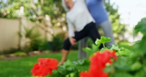 Senior Woman Doing Yoga With Assistance Outdoors