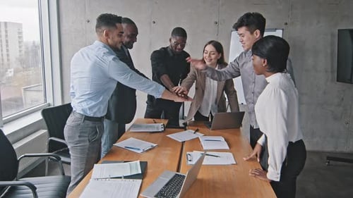 Diverse Business Team Celebrates Together in Office