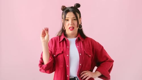 Woman Gesturing and Waving in Studio