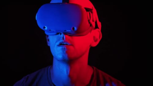 Man Experiencing Virtual Reality with VR Headset