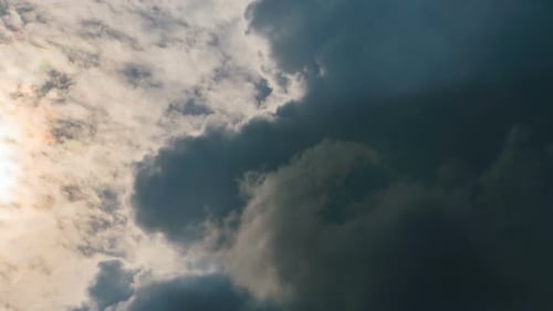 Dark and Light Clouds Moving Across the Sky