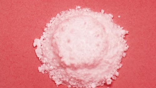 A Pill Dissolving in Water Speed Up in Macro