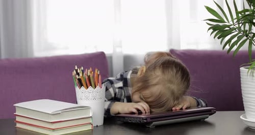 Girl Studying Online Homework Using Digital Laptop Computer. Distance Education