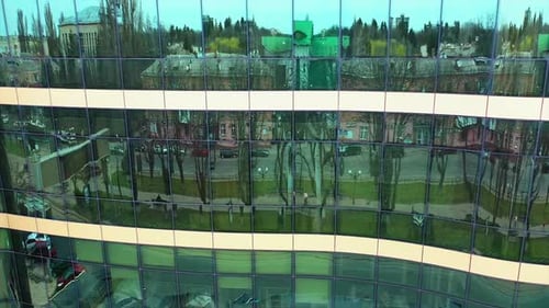 Windows of skyscraper building. Modern office skyscraper with glass windows and reflection