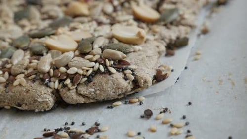 Fresh Dough Covered In Assorted Seeds
