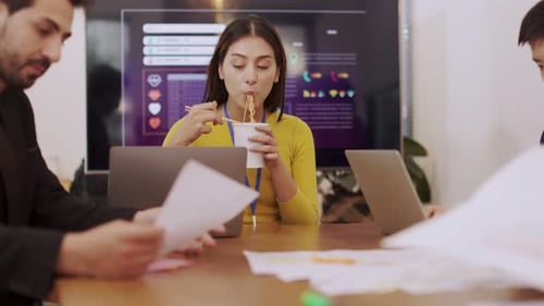 Group of young adults working with technology