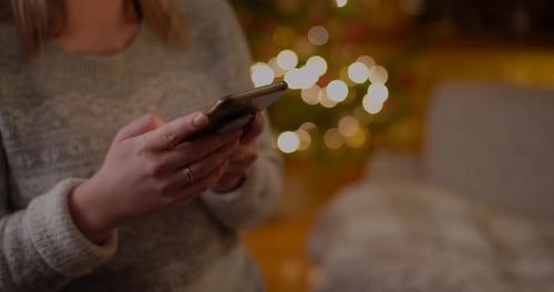 Woman Browsing Internet on Mobile Phone