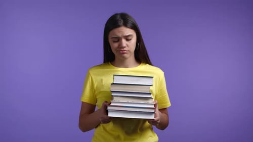 European Bored Woman As Student is Dissatisfied with Amount of Homework and Books