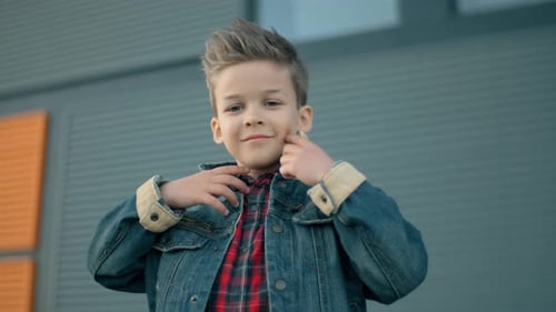 Stylish Boy Smiling in Denim Jacket Close-Up