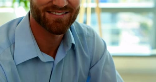 Man Smiling In Office Close Up