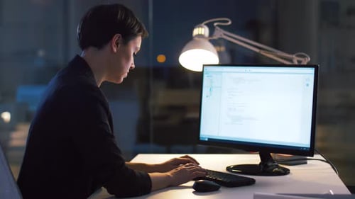 Businesswoman Working on Computer at Night Office 20