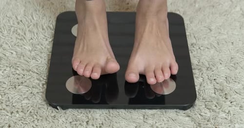 Measuring weight at home.