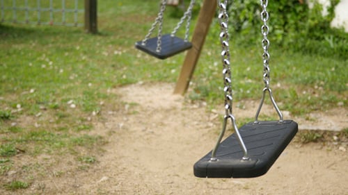 Empty Swings Swinging