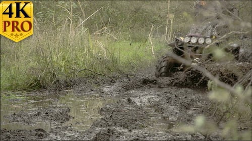 A 4x4 Offroad Vehicle Splunging on the Mud
