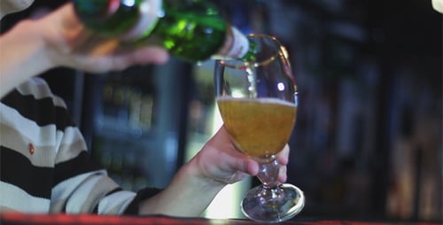 Bartender Pours Beer