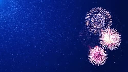 Exploding Fireworks and Shimmering Particles on Blue Background