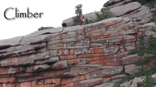 Climber packs the rope
