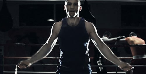 Man Jumps Rope in Boxing Ring