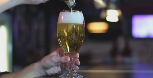 Man Pours Beer