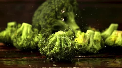 Super Slow Motion on Broccoli Drops Drops Water
