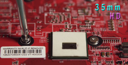 Removing A Screw From A Computer Circuit Board 5