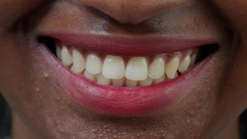 Close Up Of Person Smiling with Red Lipstick