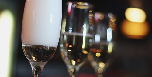 Champagne Poured into Glasses for Celebration