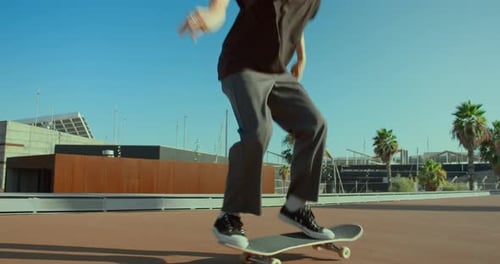 Skateboarder Does Tricks on Camera in California