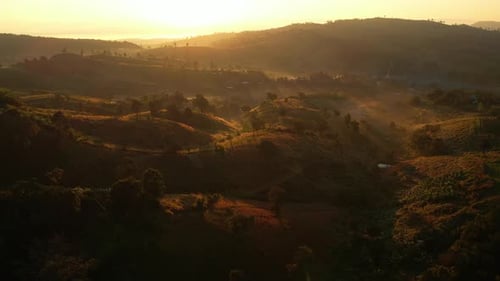 4K Morning mist over a rural village in the high mountains.
