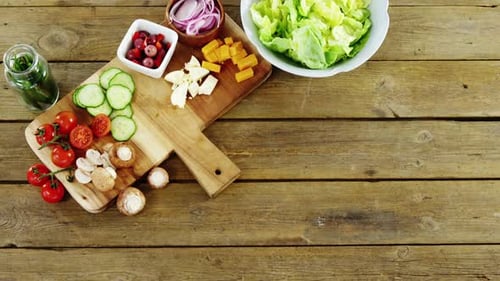Salad Ingredients on Wooden Table, Overhead Shot