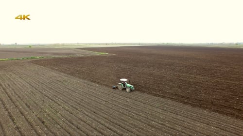 Aerial Tractor Working Field