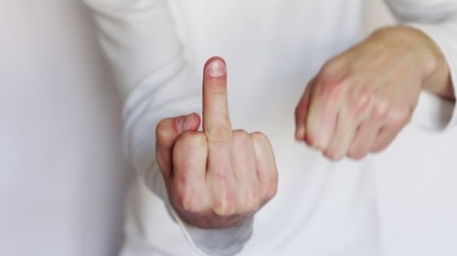 Adult Hand Gesture of Defiance with Middle Finger