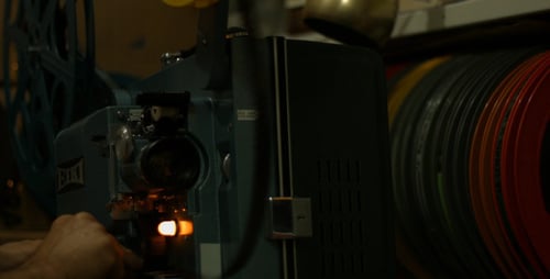Vintage Film Projector in Dark Room