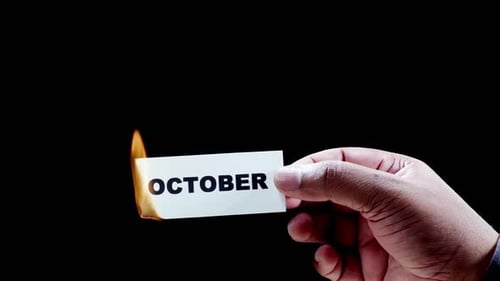 Burning October Card in Close Up Shot