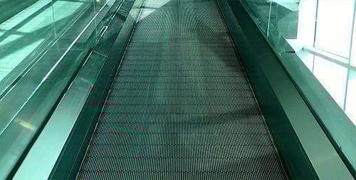 Empty Escalator Moving Upwards in Urban Environment