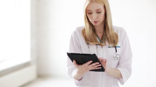 Female Doctor With Tablet Pc