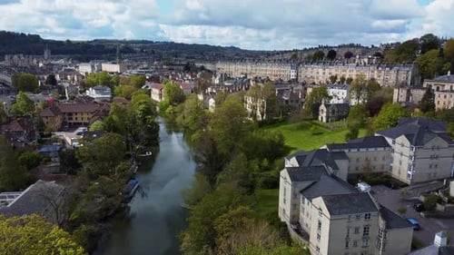 Idyllic drone shot of Bath, somerset facing west along the River Avon