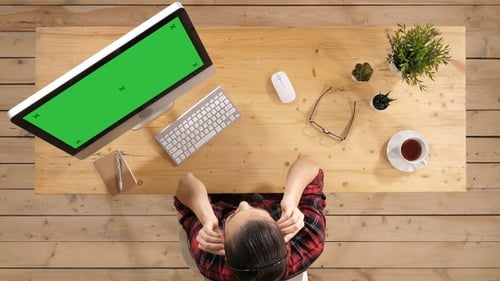 Professional call center operator working in casual office.