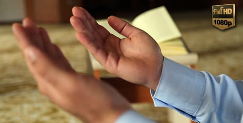 Man Praying Inside Mosque With Open Hands