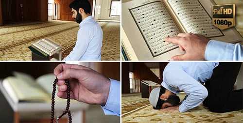 Man Reads and Prays in a Mosque