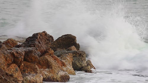 Sea Waves Breaking On Rock