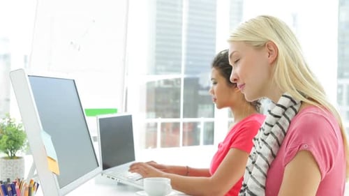 Focused Creative Designer Working On Computers