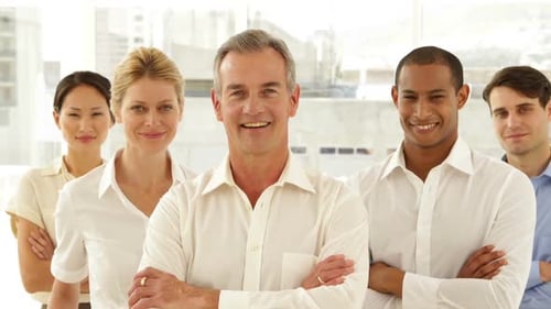 Diverse Team Smiles in Modern Workplace