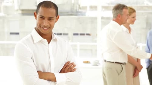 Smiling Business Team Meeting in Bright Office