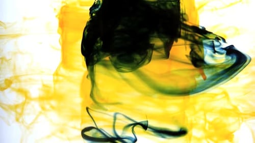 Black and Yellow Ink Swirling Abstractly