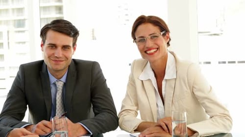 Business Team Meeting and Shaking Hands in Office