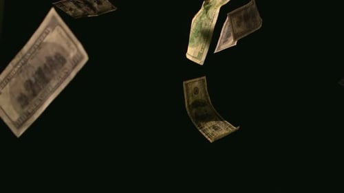 Dollar Bills Falling On Black Background